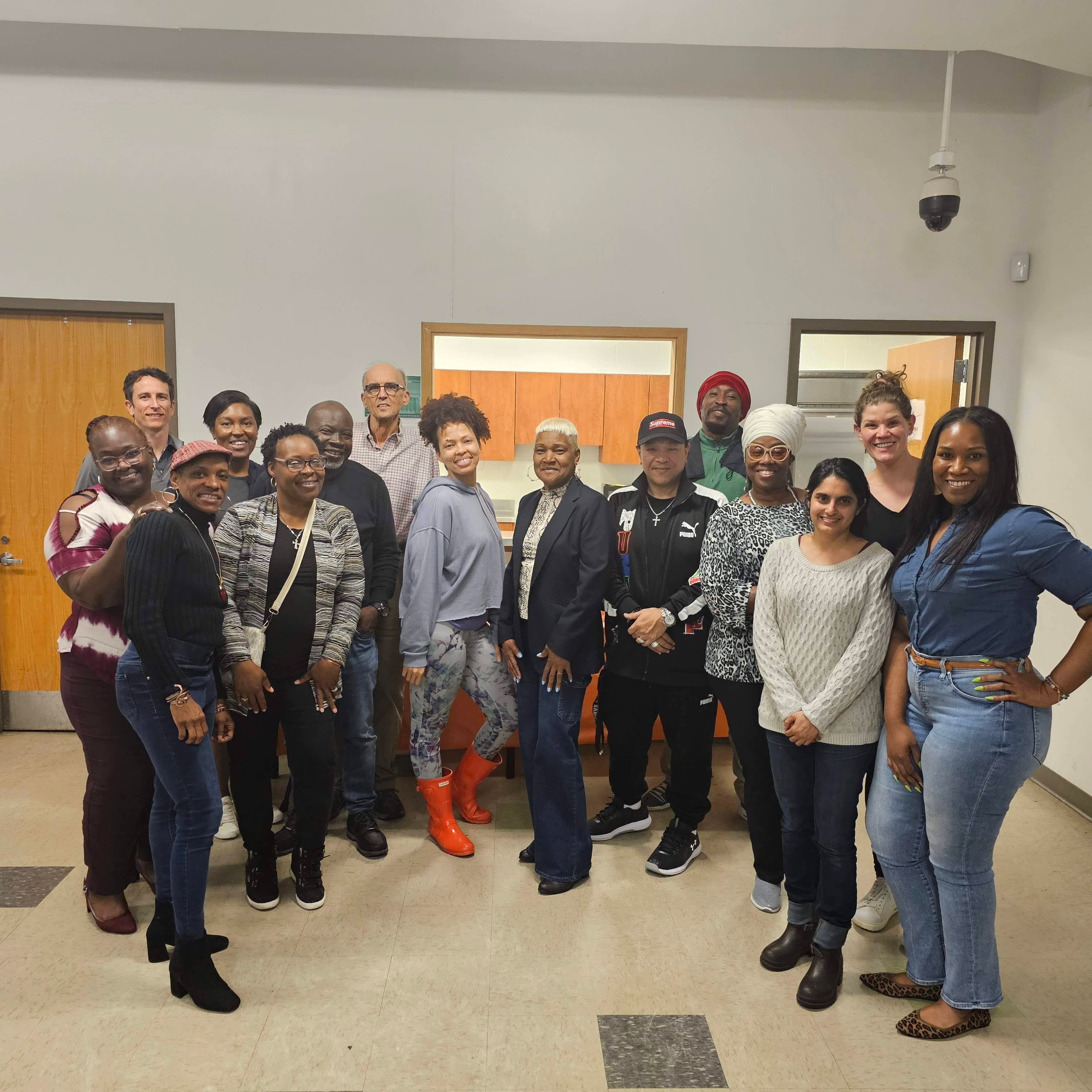 Community members and professionals collaborating outdoors